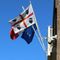 Quattro Mori di Sardegna accanto al Tricolore italiano e alla bandiera europea