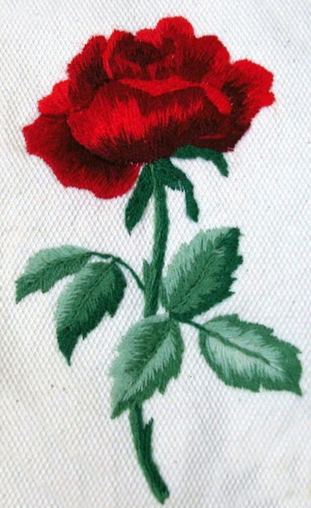 Rosa, ricamo “Bandera”, opera delle Donne del filet di “Su Nuraghe”.