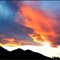 Spettacolo al tramonto: il cielo si accende di rosso nella foto di Paolo Rosazza Pela