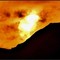 Eclissi di Sole, due scatti del fenomeno tra nubi e rilievi - Foto paolo Rosazza Pela
