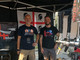 Nell’immagine, Fabio Serra, mastro birraio e maltatore, responsabile della produzione del Birrificio 4 Mori di Montevecchio, con Fabio Marrale a Biella, presso lo stand del birrificio durante “Bolle di Malto”.