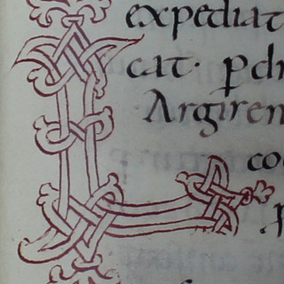 Capolettera “L”, Sacramentarium Episcopi Warmundi (Sacramentario del Vescovo Warmondo di Ivrea): fine secolo X, Ivrea, Biblioteca Capitolare, Ms 31 LXXXVI). Priuli Verlucca,1990, copia posseduta a Biella dal Comm. Mario Coda.