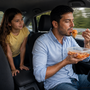 Biellese, spaghetti al volante e bimbi senza cintura: il pericoloso campionario delle distrazioni in auto - immagine generata dall'ia